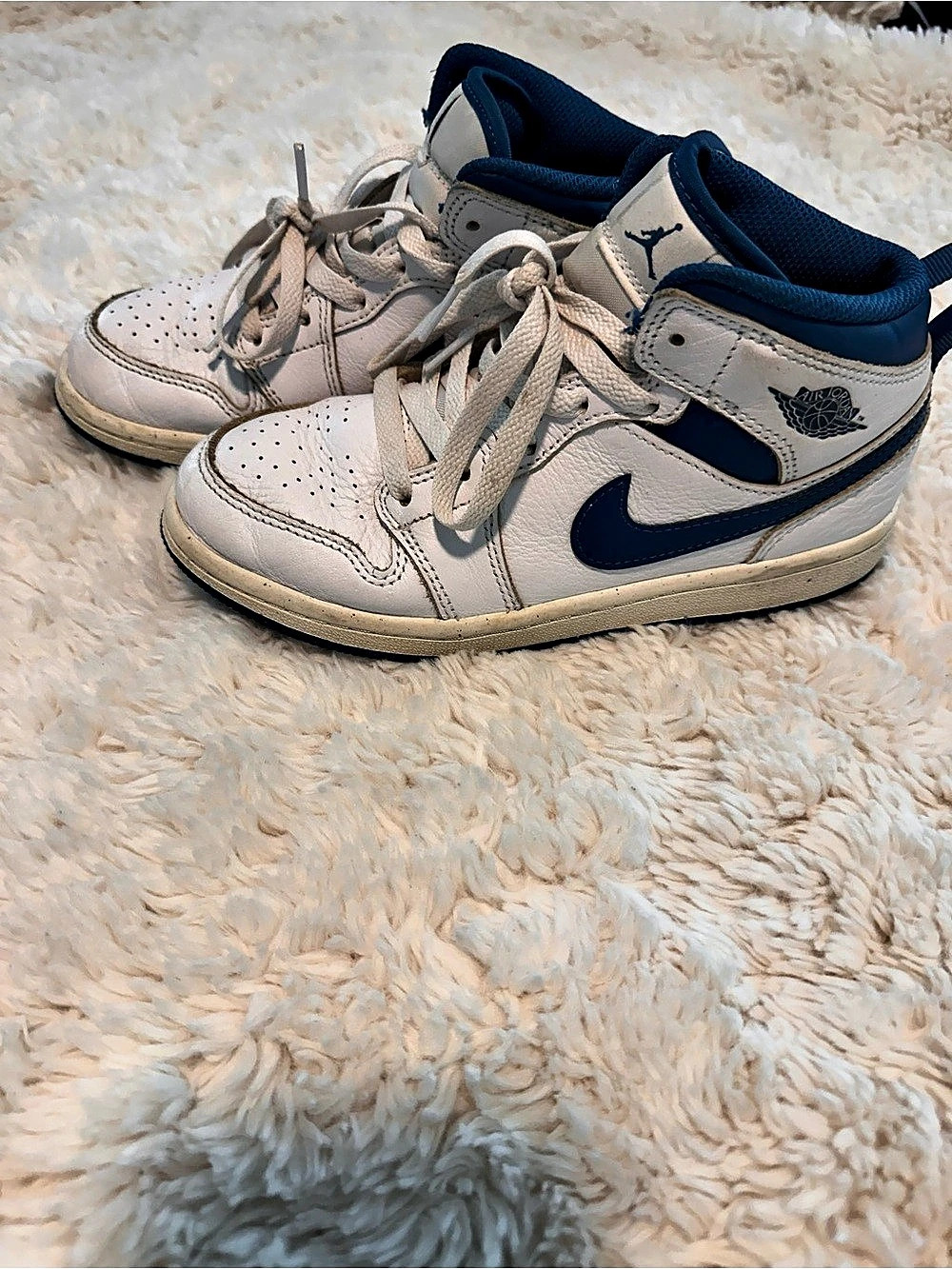 Jordan Air Jordan 1 Mid Sneakers in White & Blue